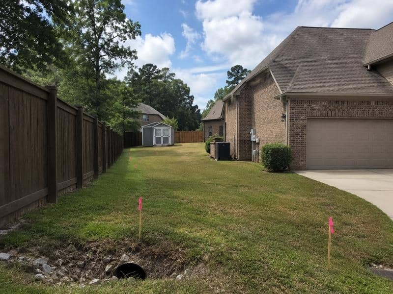 Lot Survey showing fence driveway and property boundary features in Alabaster Alabama